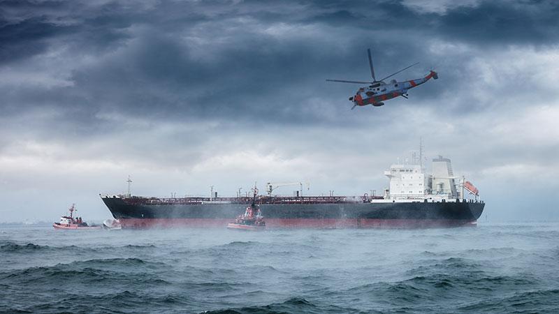 Helicopter approaching ship