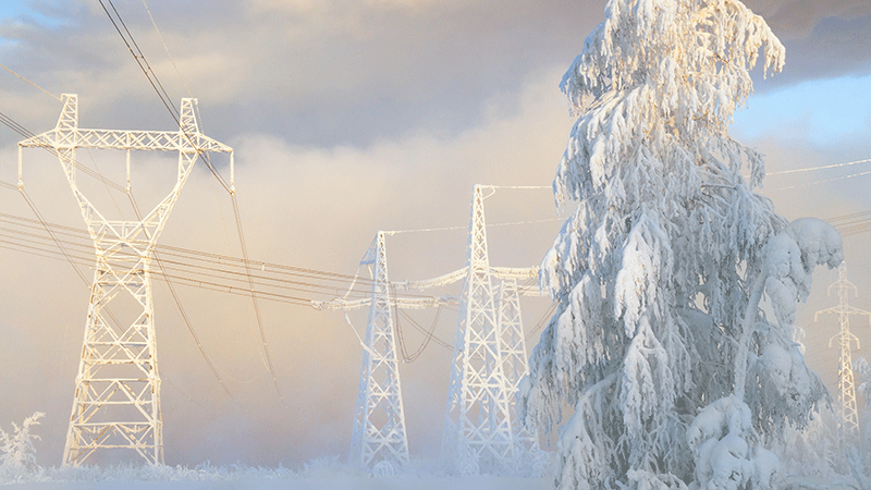 Powerlines in winter landscape