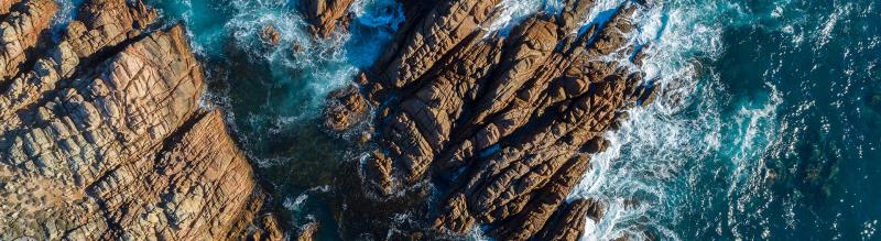 Large waves that crash into the sea cliffs Large waves that crash into the sea cliffs