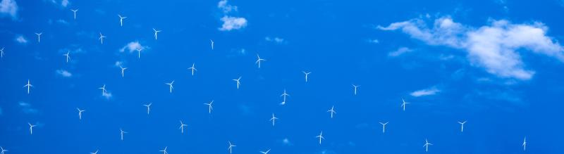 Modern windmills in an offshore wind farm in Northern Europe HERO_tall Modern-windmills-in-an-offshore-wind-farm-in-Northern-Europe_Vais_-_HERO_tall